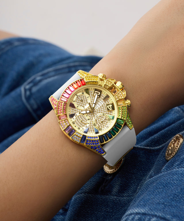 GUESS Ladies Pride Limited Edition White Gold Tone Analog Watch with colorful gemstones on a wrist against a neutral background