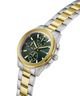 Two-tone silver and gold watch with a green dial on a white background lifestyle