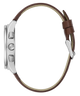 Watch with brown leather strap and silver case on a white background