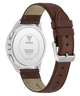Guess watch with brown leather strap and silver case on a white background