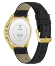Guess watch with black strap and gold case on a white background