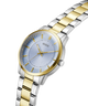 Two-tone silver and gold watch with a blue face on a transparent background lifestyle