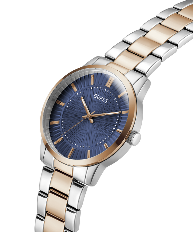 Guess watch with silver and rose gold band on a white background lifestyle