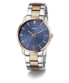 Two-tone Guess watch with blue dial on a white background