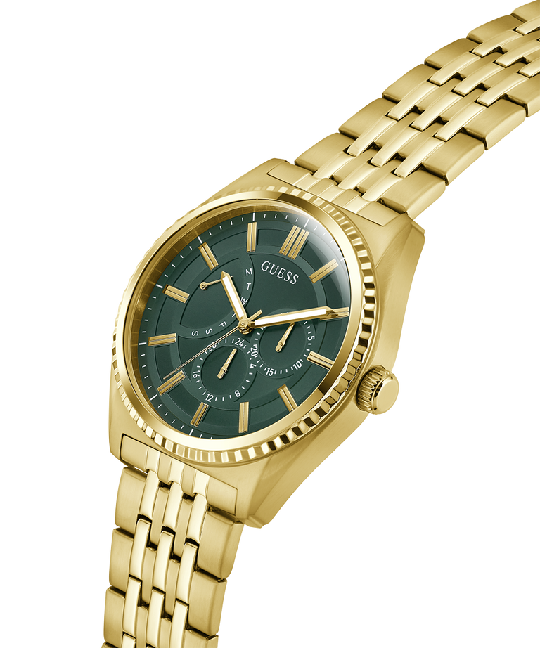 Gold watch with a green face on a white background lifestyle
