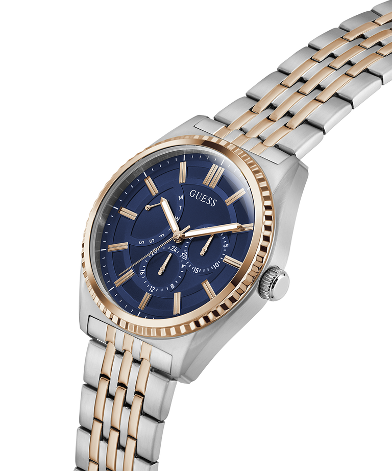 Two-tone watch with blue dial and gold accents on a white background lifestyle