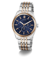 Two-tone GUESS Mens 2-Tone Analog Watch with blue dial and gold accents on a white background