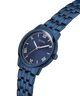 Blue Guess watch with a clear background lifestyle