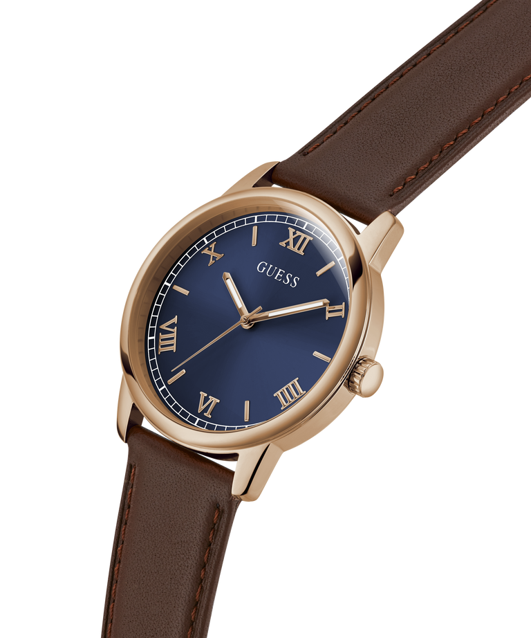 Guess watch with brown leather strap and blue dial on a white background lifestyle