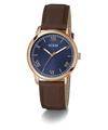 Guess watch with brown leather strap and blue dial on a white background