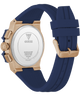 GUESS Mens Midnight Blue Rose Gold Tone Analog Watch with blue strap and gold case on a transparent background