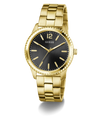 Gold GUESS Mens Gold Tone Analog Watch with black dial on a white background