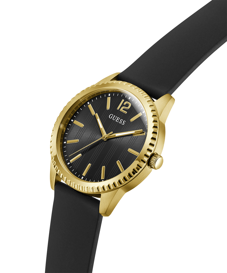 Gold and black watch with 'Guess' branding on a white background lifestyle