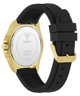 Guess watch with black strap and gold case on a white background