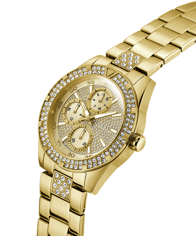 Gold watch with diamond-studded face on a white background lifestyle