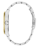 Close-up of a silver watch band with gold accents on a white background