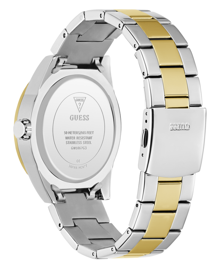 Close-up of a Guess watch with a two-tone metal band on a white background