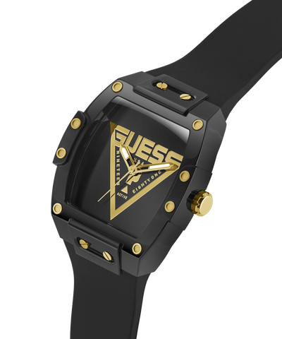 Black and gold Guess watch on a white background lifestyle