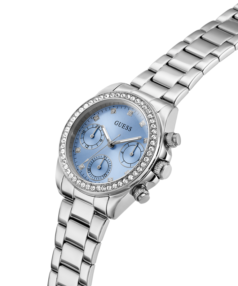 GUESS Ladies Victoria Silver Tone Multifunction Watch with a blue face on a white background lifestyle