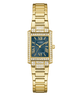 Gold GUESS Ladies Gold Tone Analog Watch with a teal face and diamond accents on a white background