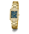Gold GUESS Ladies Gold Tone Analog Watch with a teal face on a transparent background