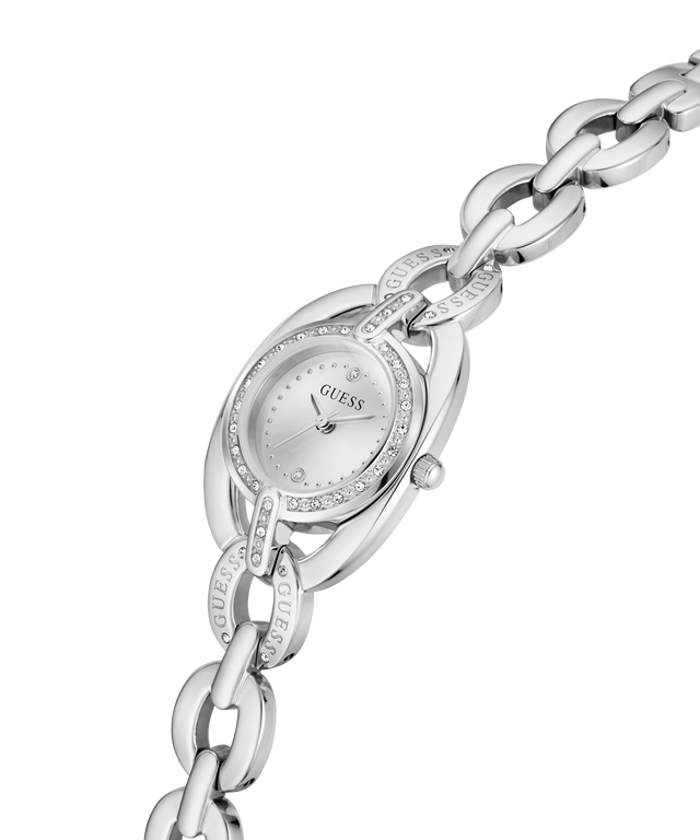 Gold-tone women's wristwatch with an oval face, diamond accents around the bezel, and a matching chain bracelet, shown on a plain white background. lifestyle