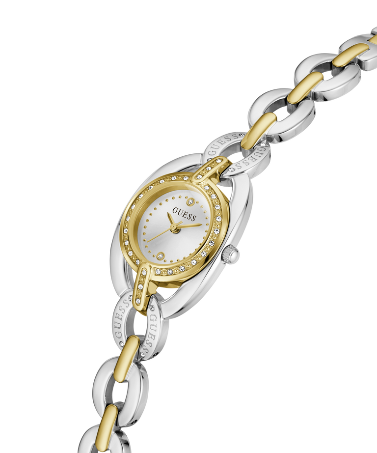 A Guess women's two-tone watch with a silver and gold-tone link bracelet, a silver-toned oval case, and a gold-tone bezel accented with small clear crystals. The white dial features gold-tone hands and hour markers. lifestyle