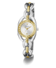 A two-tone stainless steel and gold Guess bracelet watch with a white dial, crystal-embellished bezel, and matching crystal-embellished link segments on a white background.