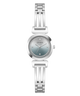 A women's silver-tone stainless steel watch by Guess, featuring a round bezel accented with small clear crystals, a silver dial with a subtle blue-green gradient, and a matching link bracelet.