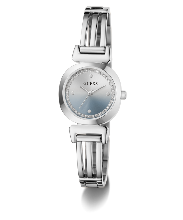 A women's GUESS wristwatch with a silver-tone metal bangle bracelet, a round bezel, and a light blue dial accented with a halo of small clear crystals.