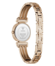 Rose gold stainless steel women's watch shown from the back, featuring a round case and a multi-link bracelet with GUESS branding engraved on the links.