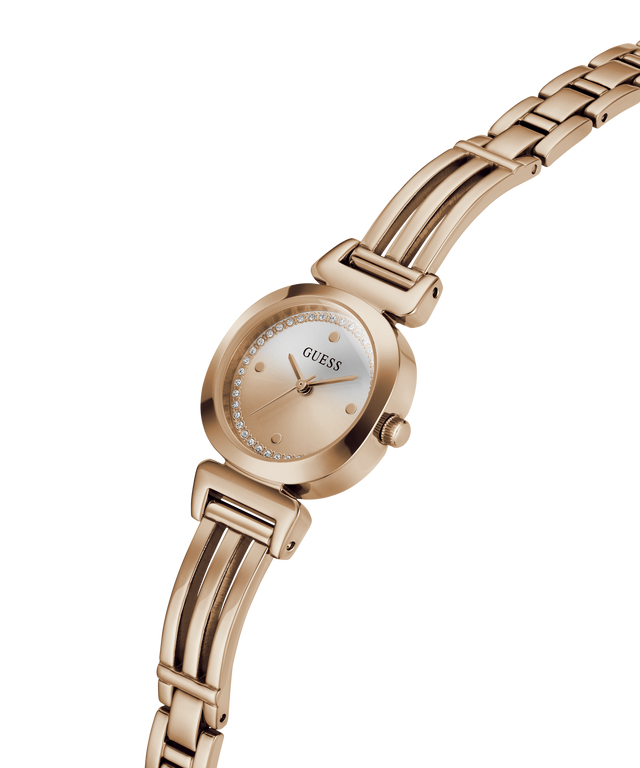 A rose gold women's wristwatch with a round bezel, a white dial with small crystal hour markers, and a matching rose gold link bracelet, shown on a plain white background. lifestyle