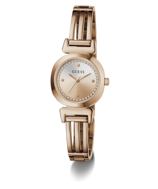 A GUESS women's watch featuring a polished rose gold-tone bangle bracelet, a round bezel accented with clear crystals, and a matching rose gold dial with gold-tone hands.