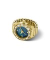 A gold-tone Guess watch ring with a bezel-set row of clear stones and a blue iridescent dial, shown on a clean white background.