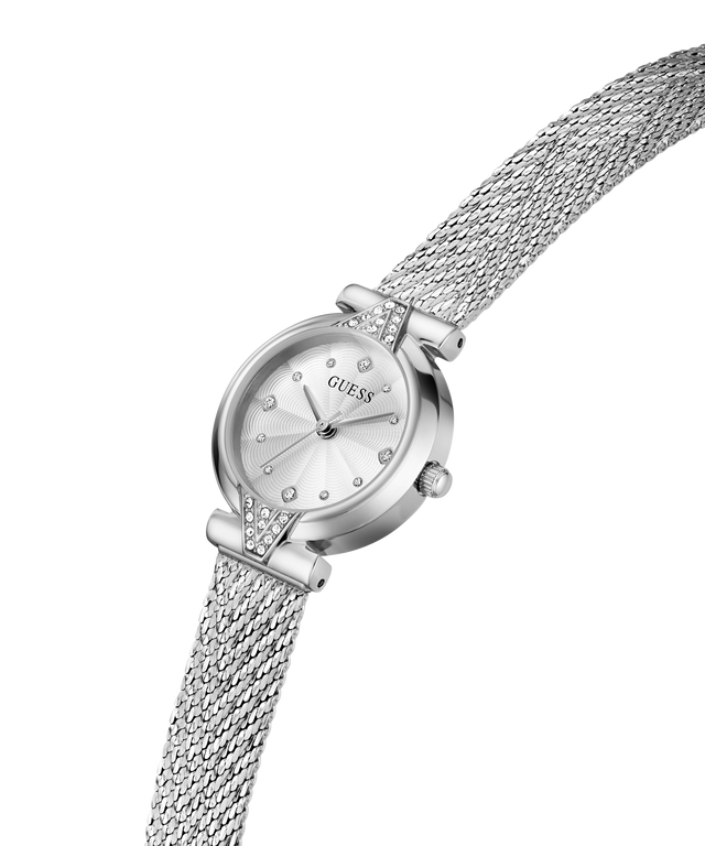 A Guess women's watch featuring a silver-tone mesh bracelet, a silver-tone oval case, and a white dial with crystal hour markers. lifestyle