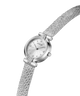 A Guess women's watch featuring a silver-tone mesh bracelet, a silver-tone oval case, and a white dial with crystal hour markers. lifestyle