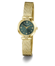 A gold-tone Guess wristwatch with a textured mesh band, a round green dial, and crystal hour markers, shown on a clean white background.
