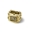 A gold-tone rectangular watch ring with a patterned dial featuring black, gold, and white spots, set against a clean white background.