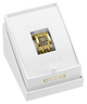 A gold-tone rectangular watch ring with a black and gold patterned dial, presented inside a white Guess gift box.