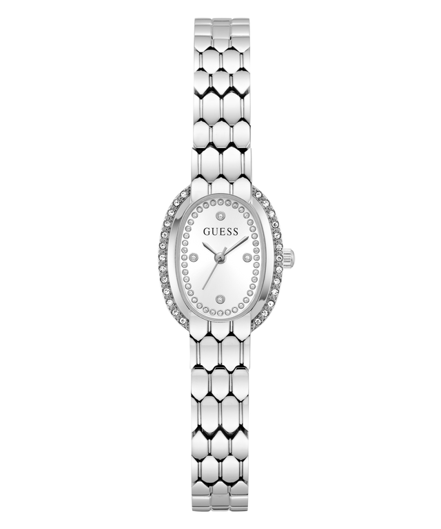 A silver-tone women's wristwatch with an oval face, crystal rhinestone bezel, and a matching honeycomb-patterned metal link bracelet. The dial is silver with the brand name 'GUESS' printed at 12 o'clock.