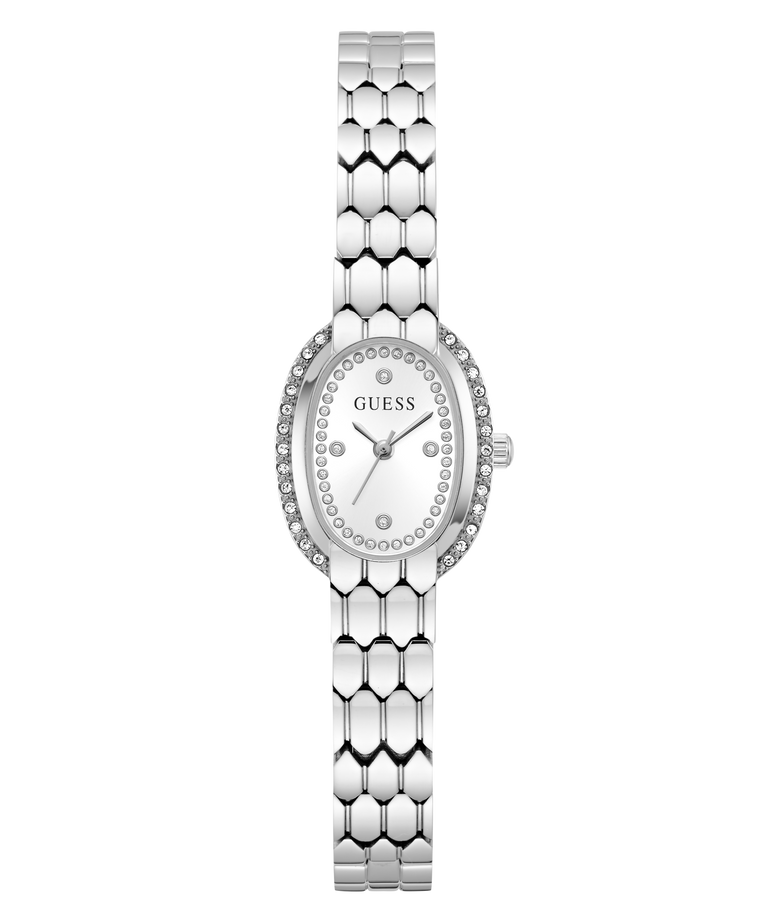 A silver-tone women's wristwatch with an oval face, crystal rhinestone bezel, and a matching honeycomb-patterned metal link bracelet. The dial is silver with the brand name 'GUESS' printed at 12 o'clock.