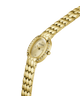 Gold-tone GUESS women's watch with an oval crystal-detailed dial and a matching textured link bracelet, shown on a plain white background. lifestyle