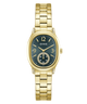 Gold-tone stainless steel women's watch by GUESS with an oval case, dark blue dial, and matching metal link bracelet, shown on a plain white background.