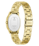 Gold-tone stainless steel watch with an oval case and matching metal link bracelet, shown from the back on a clean white background. The dial is white with GUESS branding and technical specifications, and the clasp is marked SS.