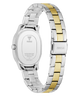 A GUESS women's stainless steel watch with a two-tone link bracelet, shown from the back. The bracelet features alternating silver and gold-tone links, and the back of the case is visible with the GUESS logo and 'SSC203' printed on the clasp.