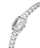 A silver-tone stainless steel women's watch by Guess, featuring a rectangular bezel encrusted with clear crystals, a silver dial with a date window, and a matching steel link bracelet, shown on a plain white background. lifestyle