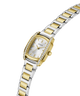 A two-tone Guess watch with a silver and gold-tone metal link bracelet, a silver dial, and a bezel accented with small clear crystals, shown on a plain white background. lifestyle