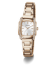 A Guess women's analog watch with a rose gold-tone metal link bracelet, a bezel accented with clear crystals, and a white sunburst dial.