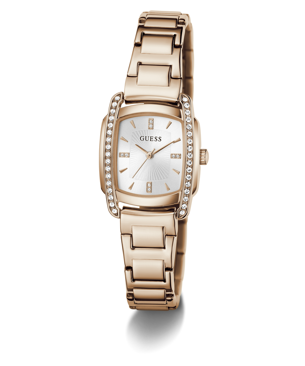 A Guess women's analog watch with a rose gold-tone metal link bracelet, a bezel accented with clear crystals, and a white sunburst dial.