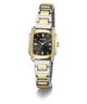 A Guess women's watch featuring a two-tone silver and gold-tone metal bracelet, a gold-tone case, a black dial, and crystal accents on the bezel and lugs, shown on a clean white background.